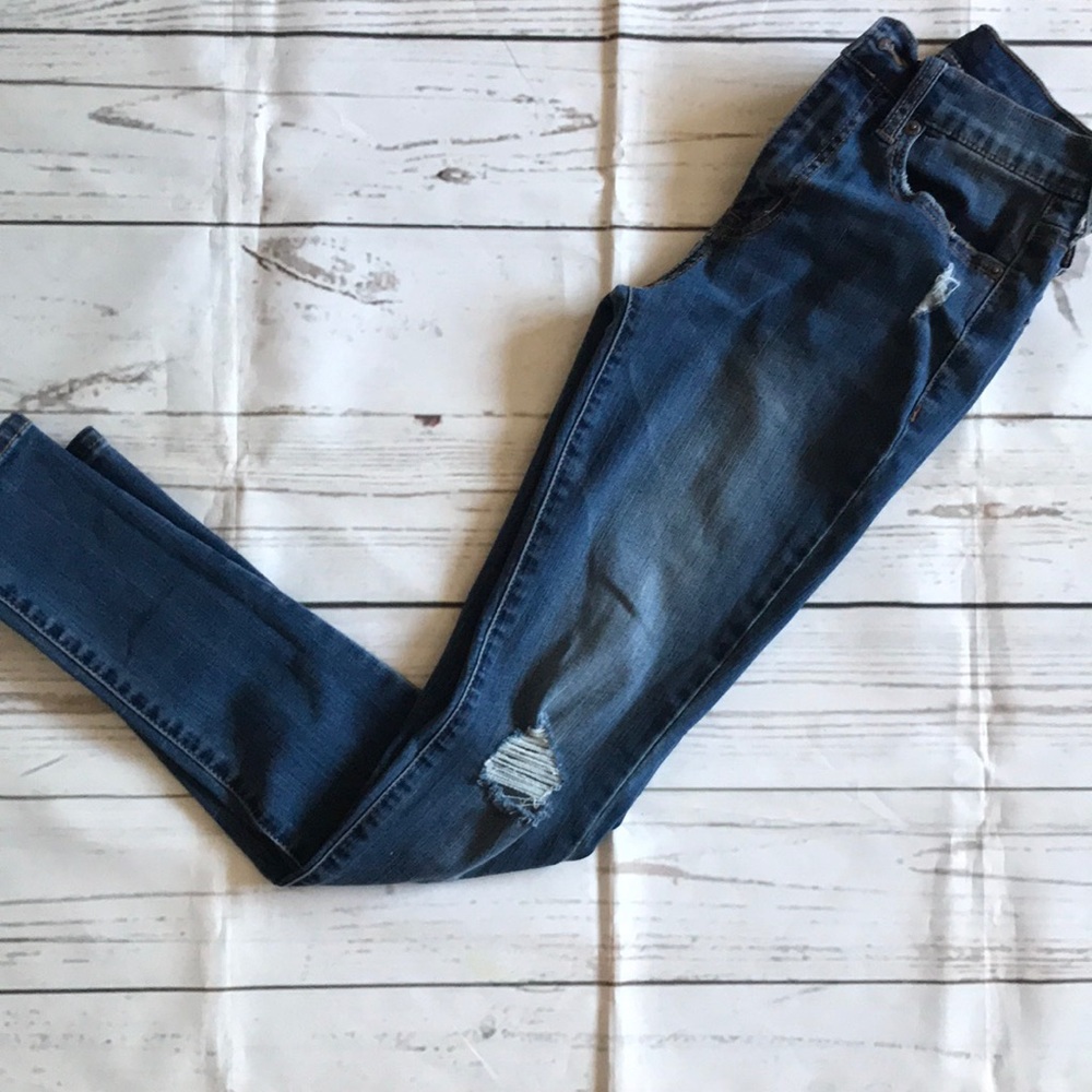 Distressed high rise jeans